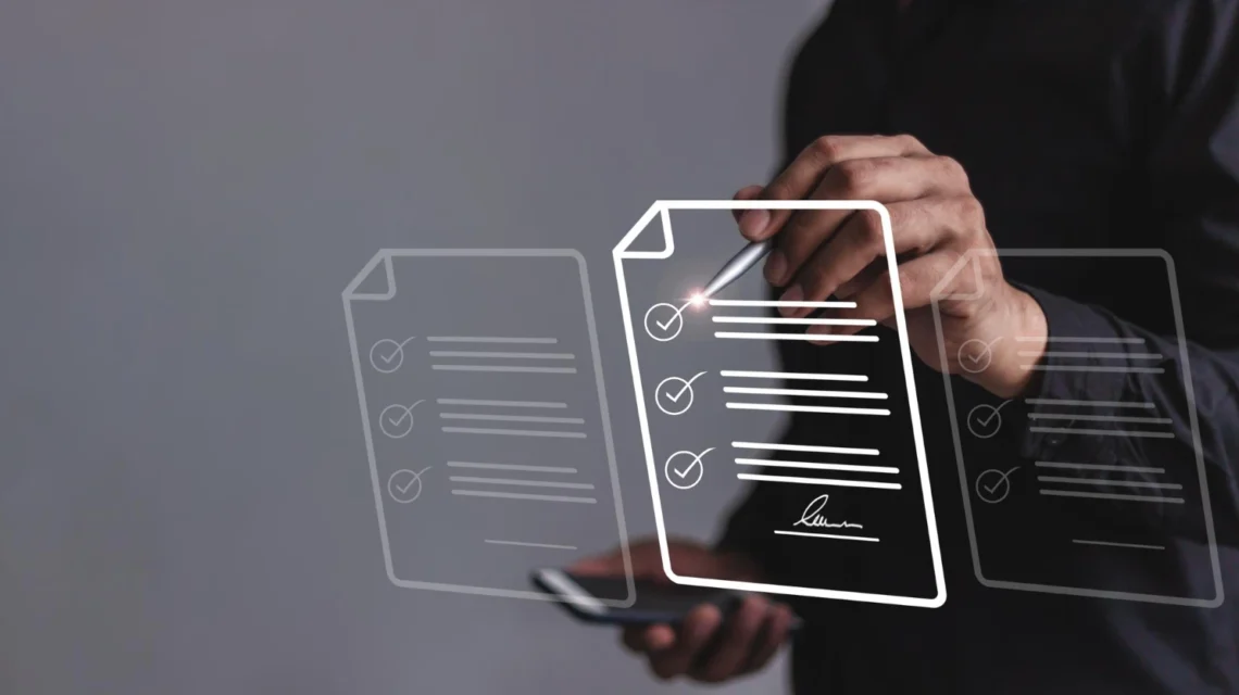 Pessoa assinando documento digital sobre as novas regulamentações para válvulas e mangueiras industriais, destacando a importância de adaptação ao futuro industrial.